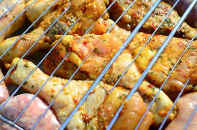 High angle view of meat on barbecue grill