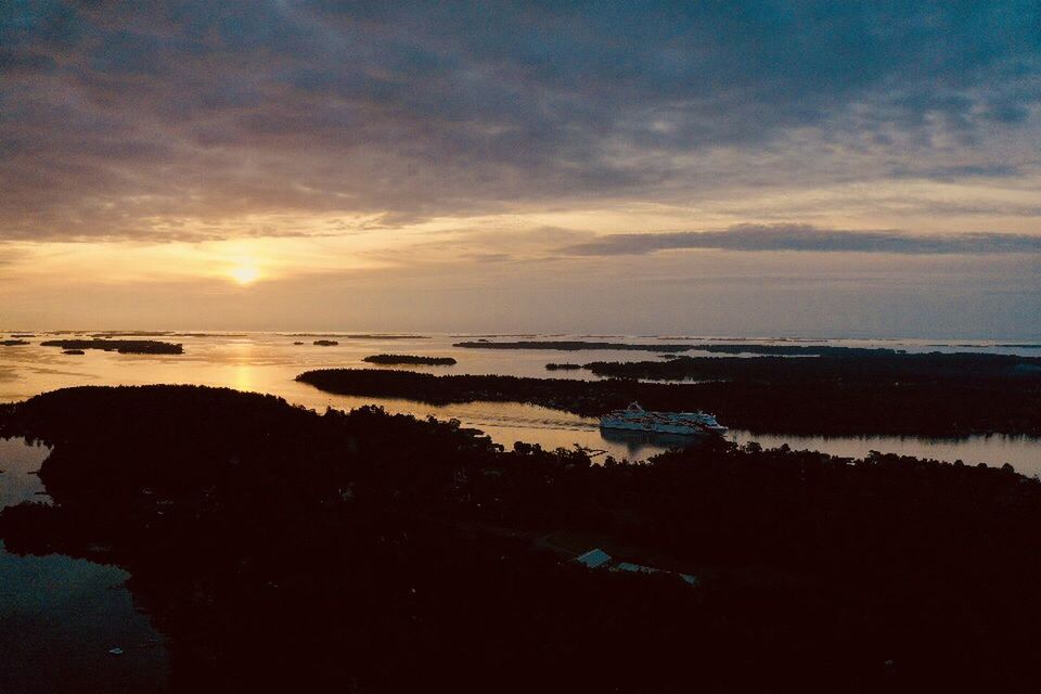 SCENIC VIEW OF SEA DURING SUNSET