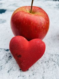 Close-up of heart shape on apple