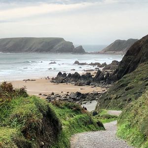 Scenic view of beach against sky