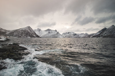 View from isolated village of husoy on the island of senja, norway. a view of  stormy norwegian sea 