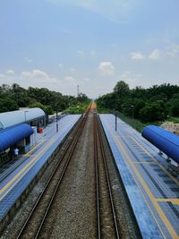 High angle view of railroad station platform against sky