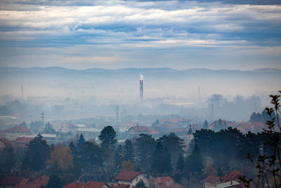Panoramic view of buildings against sky during sunset