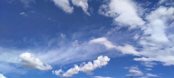 Low angle view of clouds in blue sky