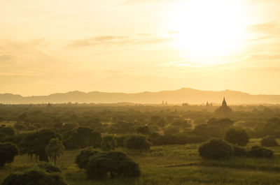 Scenic view of landscape against sky during sunset