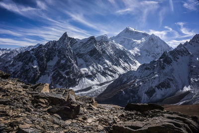 Scenic view of snowcapped mountains against sky