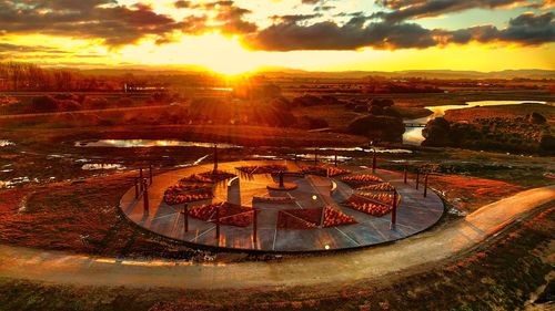 Aerial view of landscape against sky during sunset