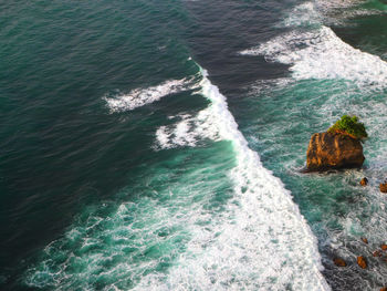 High angle view of surf on beach