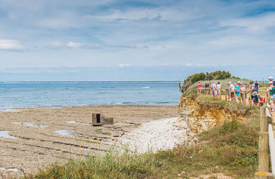 Scenic view of beach against sky