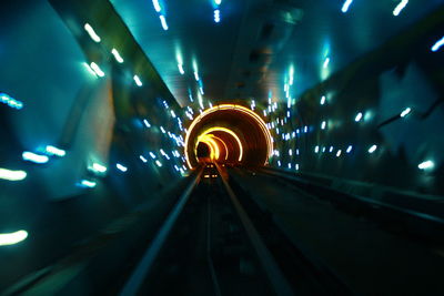 Blurred motion of illuminated tunnel