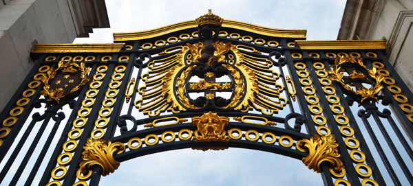 Low angle view of ornate building against sky