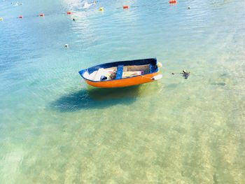 High angle view of boat moored on sea