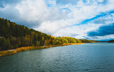 Scenic view of sea against sky in autumn