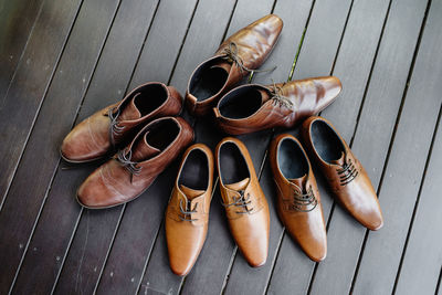 High angle view of shoes on floorboard