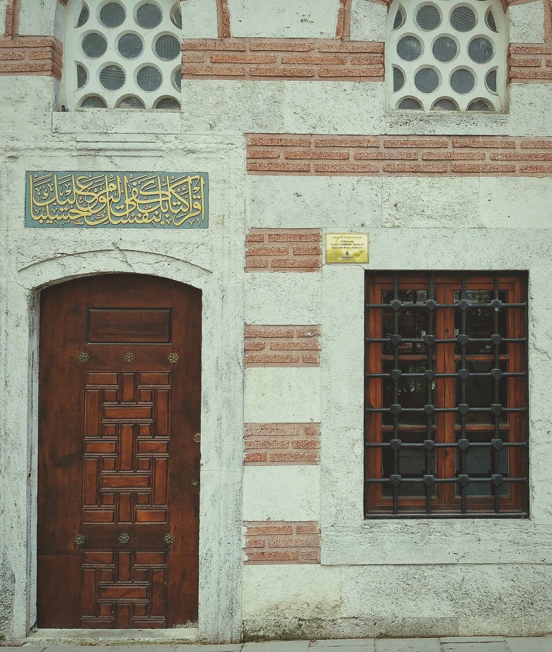 architecture, building exterior, built structure, wall - building feature, window, door, closed, wall, brick wall, art and craft, outdoors, pattern, day, no people, building, facade, house, entrance, art, close-up