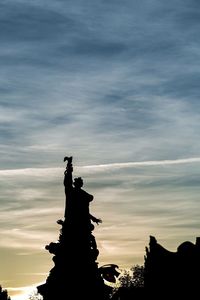 Low angle view of statue against sky