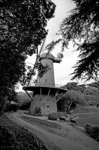 Traditional windmill against sky