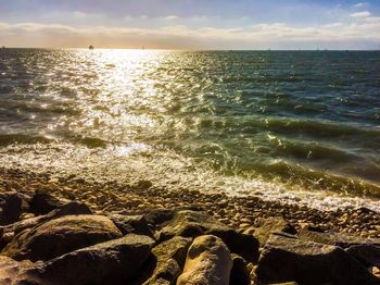 Scenic view of sea against sky during sunset