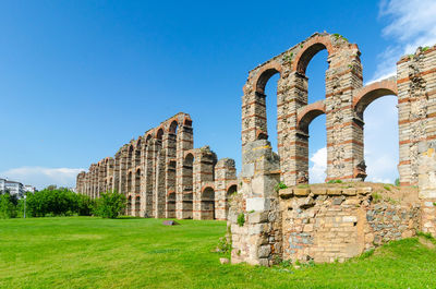 Old ruin building against blue sky