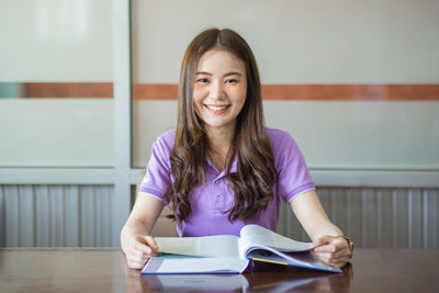 Portrait of a smiling young woman