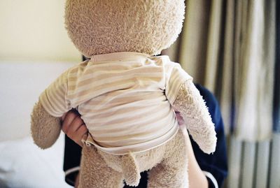 Rear view of girl at home