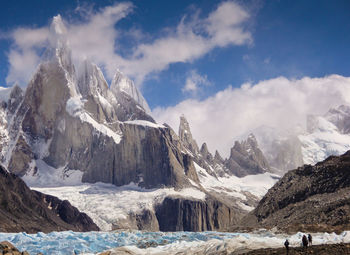 Scenic view of landscape with mountain range in the background