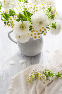 Close-up of white flowers on table