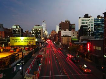 Traffic on city street at night