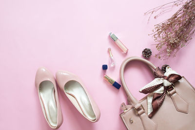 High angle view of mannequin on table against white background