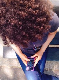 Woman photographing through camera