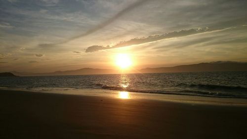 Scenic view of sea at sunset