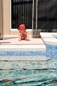 Woman swimming in pool