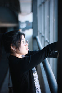 Side view of woman looking away