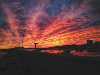 Scenic view of dramatic sky during sunset