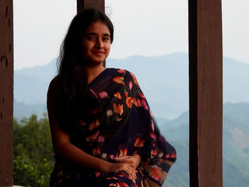 Portrait of a young girl in morning sunlight