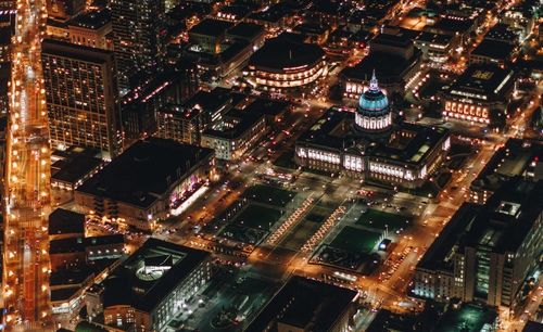 High angle view of illuminated cityscape at night