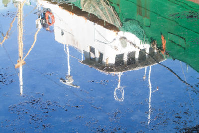 High angle view of boat reflecting on river