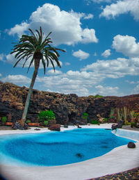 Scenic view of swimming pool against sky