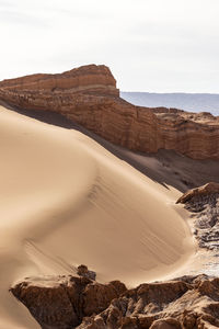 Rock formations in desert against sky