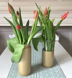 Close-up of succulent plant in vase on table at home