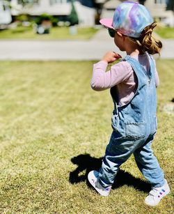 Full length of girl playing in the yard carefree