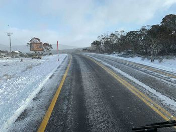 Road against sky during winter