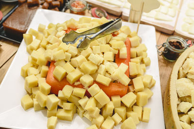 High angle view of chopped vegetables on cutting board