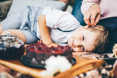 Cropped hand of man holding food