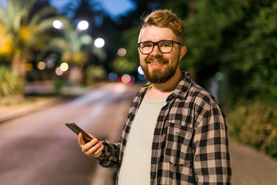 Young man using mobile phone