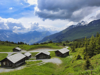 Scenic view of landscape and mountains against sky