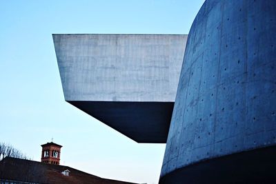 Low angle view of building against blue sky