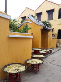 Chairs and tables in front of building