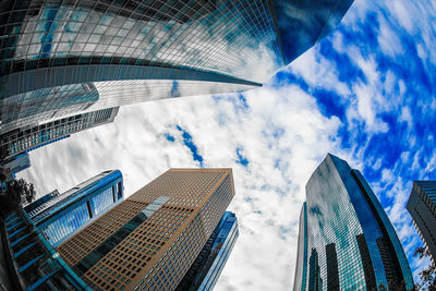 Low angle view of modern buildings against sky