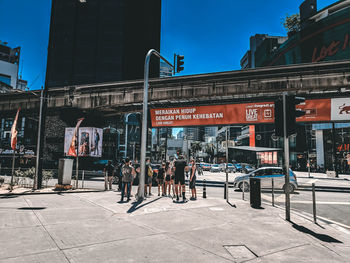 People on street in city